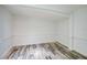 Empty room with a painted white with wood-look flooring at 940 Valencia Ave, Daytona Beach, FL 32114