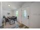 Modern dining area features sleek furniture, stylish decor, and natural light enhancing the space at 940 Valencia Ave, Daytona Beach, FL 32114