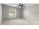Bedroom featuring a large window for natural light and ceiling fan at 941 Pizarro Dr, Daytona Beach, FL 32119