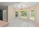 Bright breakfast nook features views and natural light, adjacent to kitchen at 941 Pizarro Dr, Daytona Beach, FL 32119