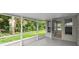 The screened lanai opens to the backyard, seamlessly blending indoor and outdoor living at 941 Pizarro Dr, Daytona Beach, FL 32119