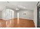 Open-concept living area showcases wood floors, recessed lighting, and seamless transition to the front entrance at 941 Pizarro Dr, Daytona Beach, FL 32119