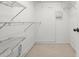 Walk-in closet featuring wire shelving and ample storage space at 941 Pizarro Dr, Daytona Beach, FL 32119