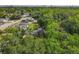 An aerial shot of the community, featuring lush trees and houses in a peaceful suburban setting at 102 Judges Ln, Port Orange, FL 32129