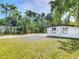 Home exterior with a large yard and lots of parking available at 102 Judges Ln, Port Orange, FL 32129