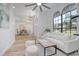 Spacious living room with vaulted ceilings, modern decor, and an open floor plan at 104 Balmoral Ct, Debary, FL 32713