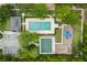 Aerial view of pool, playground, and basketball court within the community at 109 Fern Springs St, Debary, FL 32713