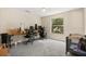 Large, versatile room with a window and two gaming stations at 109 Fern Springs St, Debary, FL 32713