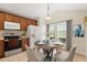 Bright kitchen featuring a breakfast nook with a large window at 109 Fern Springs St, Debary, FL 32713