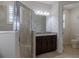 Bright bathroom featuring walk-in shower, granite countertop vanity and tile flooring at 1118 Avery Meadows Way, Deland, FL 32724