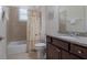 Comfortable bathroom with granite countertop vanity and shower-tub combination at 1118 Avery Meadows Way, Deland, FL 32724