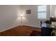 Bright office with hardwood floors, window, and desk at 1118 Avery Meadows Way, Deland, FL 32724