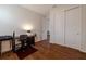 Cozy office space with hardwood floors, closet and modern furniture at 1118 Avery Meadows Way, Deland, FL 32724