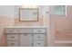 The bathroom features a vanity and mirror over the sink at 1209 James Ter, Daytona Beach, FL 32117