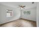 The bedroom includes laminate floors, natural lighting, and a ceiling fan at 1209 James Ter, Daytona Beach, FL 32117