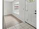 Bright entryway with new wood flooring, fresh paint, and lots of natural light at 1209 James Ter, Daytona Beach, FL 32117