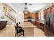 Open kitchen featuring granite countertops, stainless steel appliances, and a large island with seating at 123 Ivydale Manor Dr, Deland, FL 32724