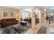 Comfortable living space boasting wood floors, an open layout, and seamless access to the dining room at 123 Ivydale Manor Dr, Deland, FL 32724