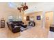 Spacious living room featuring high ceilings, ample seating, and entertainment setup at 123 Ivydale Manor Dr, Deland, FL 32724