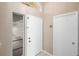 Welcoming entryway features a white front door with sidelight and neutral walls at 14634 Brightwell Ct, Orlando, FL 32824