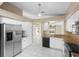 Spacious kitchen with stainless steel appliances and ample counter space at 14634 Brightwell Ct, Orlando, FL 32824