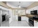 Spacious kitchen with stainless steel appliances and ample counter space at 14634 Brightwell Ct, Orlando, FL 32824