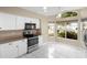 Bright kitchen features modern appliances and a cozy breakfast nook at 14634 Brightwell Ct, Orlando, FL 32824