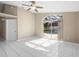 Bright room with sliding glass doors offering views of the screened pool at 14634 Brightwell Ct, Orlando, FL 32824