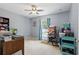 Bedroom with a ceiling fan, window, and a mix of storage solutions at 149 Angeles Rd, Debary, FL 32713