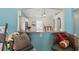 Cozy living room boasting vaulted ceilings and comfortable seating for relaxing or entertaining at 149 Angeles Rd, Debary, FL 32713