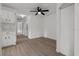Neutral bedroom showcasing ceiling fan, luxury vinyl flooring and closet at 1601 Big Tree Rd # 1301, South Daytona, FL 32119