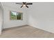 Bright bedroom featuring vinyl wood-look flooring, closet, and a window at 1601 Big Tree Rd # 1301, South Daytona, FL 32119