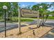 Exterior shot of the Yorktowne Estates community sign surrounded by landscaping and well-maintained grounds at 1601 Big Tree Rd # 1301, South Daytona, FL 32119