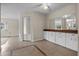 Spacious dining area featuring tile flooring, mirrored wall, and a view of the kitchen at 1601 Big Tree Rd # 1302, South Daytona, FL 32119
