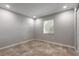 Bedroom with tile flooring, a window with blinds, and neutral wall color at 1617 Tuscaloosa Ave, Daytona Beach, FL 32117
