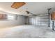 Spacious garage with a large garage door, providing ample space for parking and storage at 1617 Tuscaloosa Ave, Daytona Beach, FL 32117