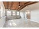Open concept living room with wood ceiling, ample windows bringing in natural light and tile floors at 1617 Tuscaloosa Ave, Daytona Beach, FL 32117