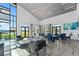 Comfortable clubhouse interior with stylish seating, lots of natural light, and lake views at 165 Azure Mist Way, Daytona Beach, FL 32124