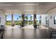 Covered outdoor seating area with tropical views from the clubhouse offers relaxed community gatherings at 165 Azure Mist Way, Daytona Beach, FL 32124