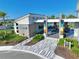 Exterior view of the community resident's club with pool views at 165 Azure Mist Way, Daytona Beach, FL 32124