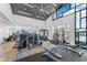 Modern community gym with state-of-the-art fitness equipment and scenic views to enhance your workout at 165 Azure Mist Way, Daytona Beach, FL 32124