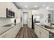 Well-appointed kitchen featuring modern appliances, granite countertops, ample cabinet space, and an open layout at 165 Azure Mist Way, Daytona Beach, FL 32124