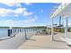 Lakefront pier with seating, a fire pit and a peaceful place to enjoy the outdoors at 165 Azure Mist Way, Daytona Beach, FL 32124