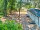 Expansive backyard view offering ample space and potential for outdoor activities and relaxation at 165 S Massachusetts Ave, Deland, FL 32724