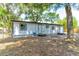 Rear exterior with dual entry points at 165 S Massachusetts Ave, Deland, FL 32724