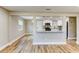 Open-concept layout offering a view into the beautifully updated kitchen at 165 S Massachusetts Ave, Deland, FL 32724