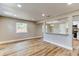 Bright living area with hardwood floors and recessed lighting at 165 S Massachusetts Ave, Deland, FL 32724