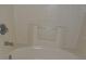 Clean bathroom features a tile surround bathtub at 1714 Urbana Ave, Deltona, FL 32725