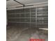 Spacious two-car garage featuring a garage door with metal supports at 1714 Urbana Ave, Deltona, FL 32725