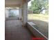 View from the tile patio to the backyard at 1714 Urbana Ave, Deltona, FL 32725